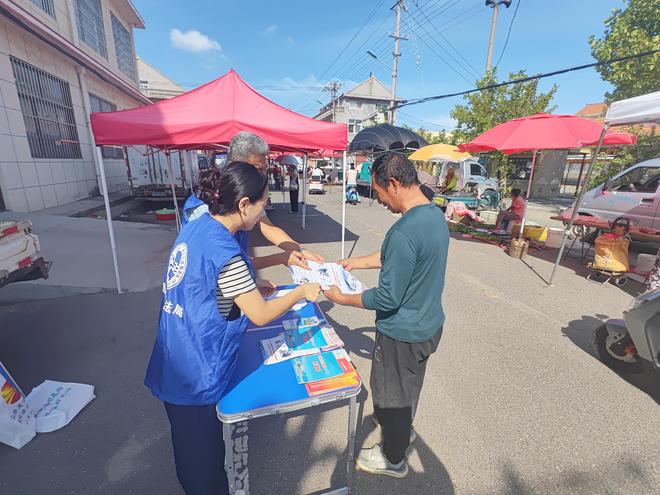 胶州市胶东司法所普法宣传活动走进集市